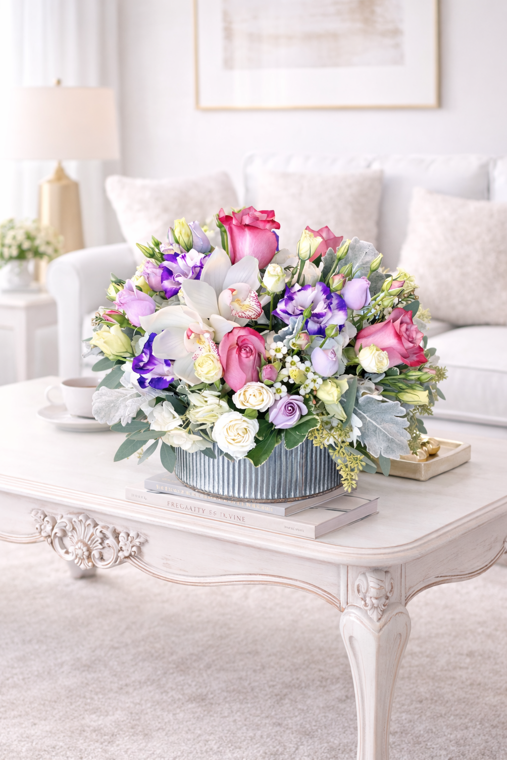 Colorful flower arrangement on a white table in a living room setting